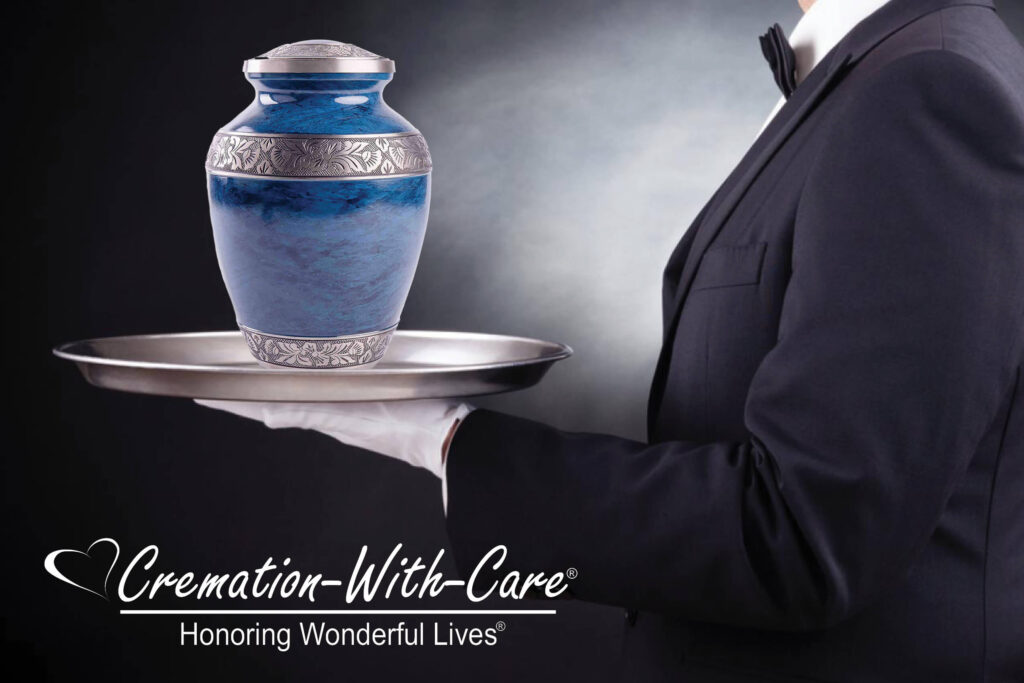 Person holding a tray with an urn on it